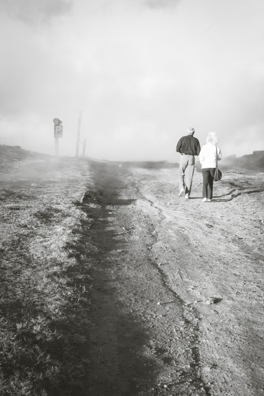 Two people walking in Iceland in black and white